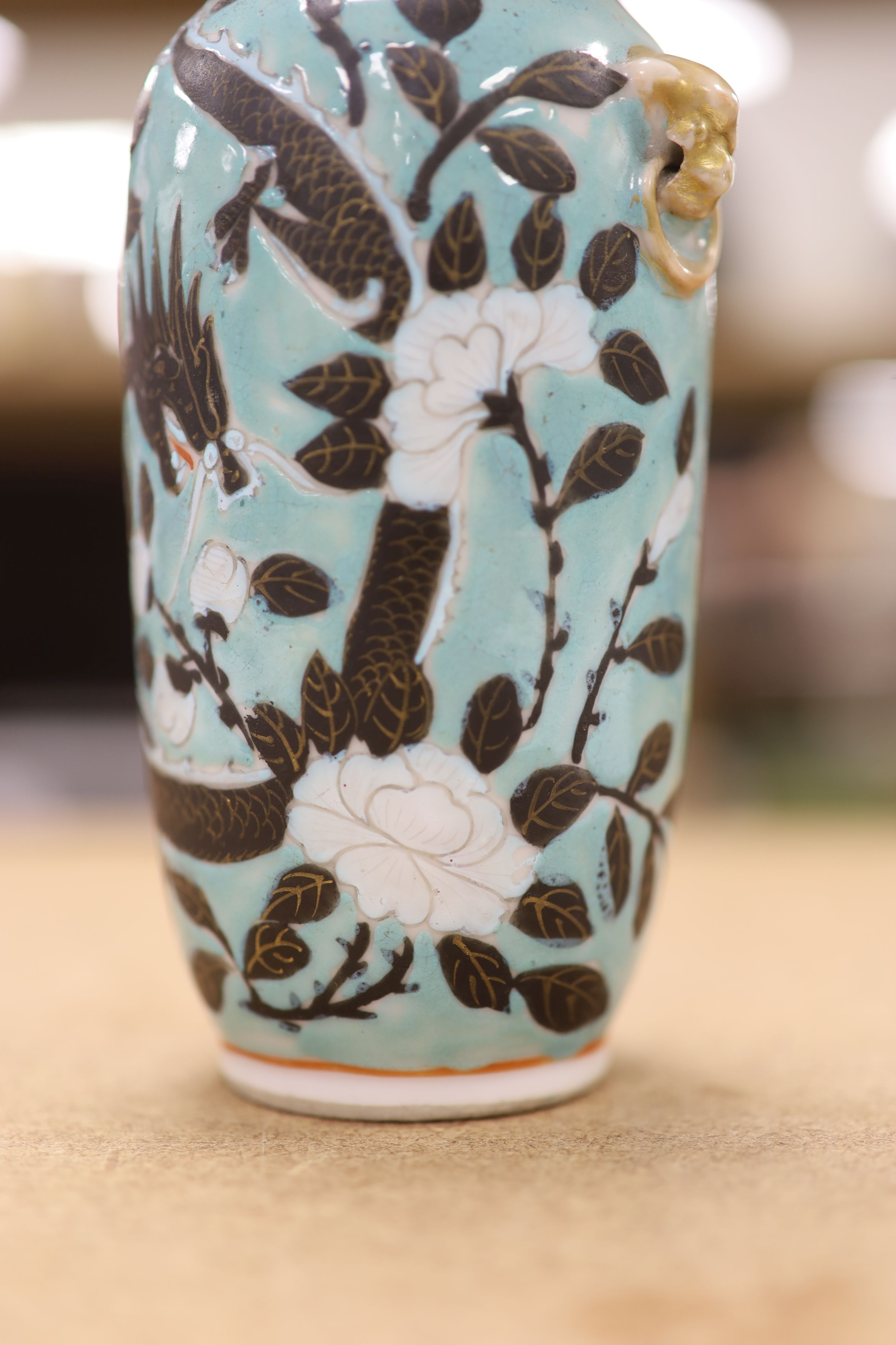 A Chinese turquoise glazed 'dragon' vase, c.1900, height 18cm